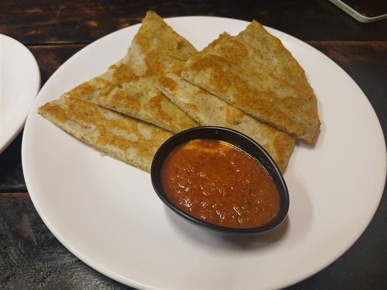 Bara lentil pancakes with tomato achar